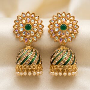 Traditional antique gold jhumka earrings with emerald green stone, iridescent crystal floral stud and pearl danglers by Shining Riva.